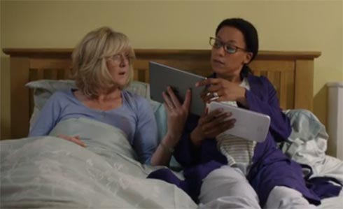 Caroline shows Kate something on her iPad