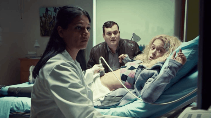 Kristian Bruun and Tatiana Maslany as Helena watch an ultrasound in Orphan Black