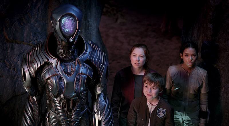 Brian Steele, Maxwell Jenkins, Mina Sundwall, and Taylor Russell in Lost in Space