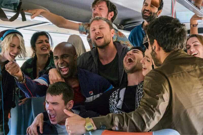 the cast of Sense8 in a group scene in a bus