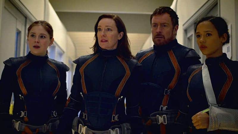 Molly Parker, Toby Stephens, Mina Sundwall, and Taylor Russell in Lost in Space

