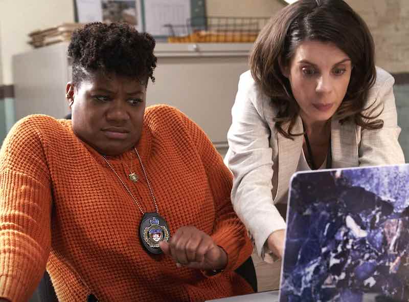 Meredith MacNeill and Adrienne C. Moore in Pretty Hard Cases