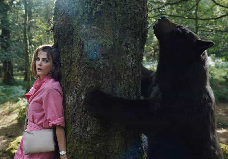 Keri Russell and the bear in Cocaine Bear