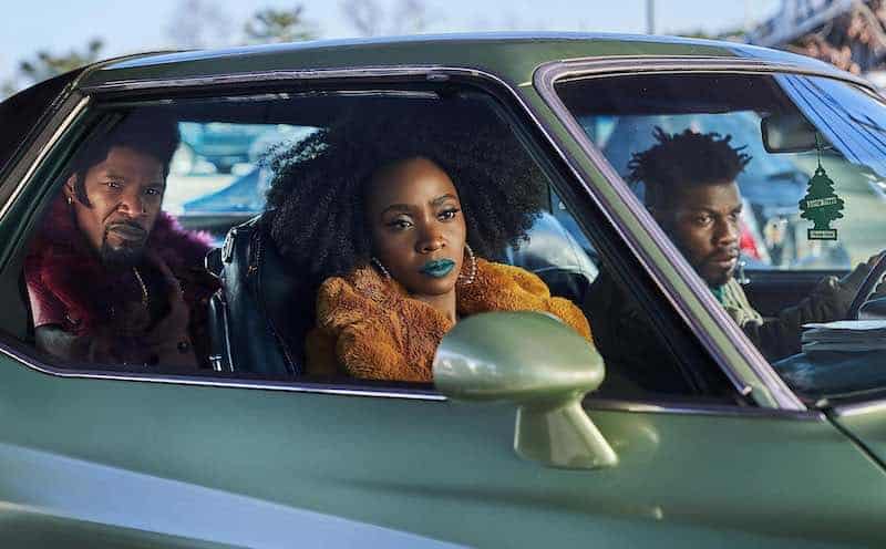 Jamie Foxx, Teyonah Parris, and John Boyega in They Cloned Tyrone