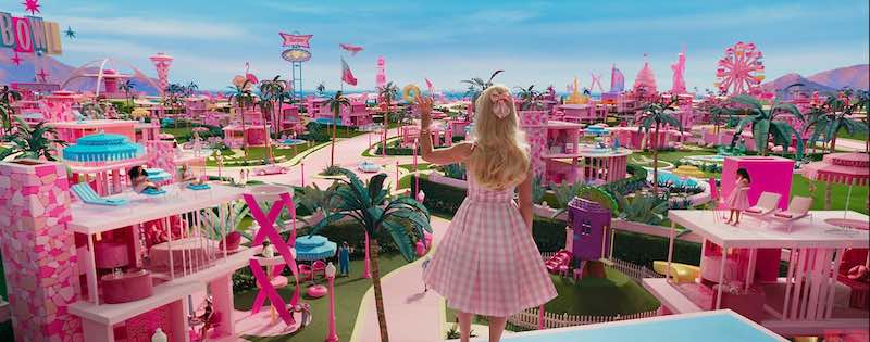 Margot Robbie surveys Barbieland